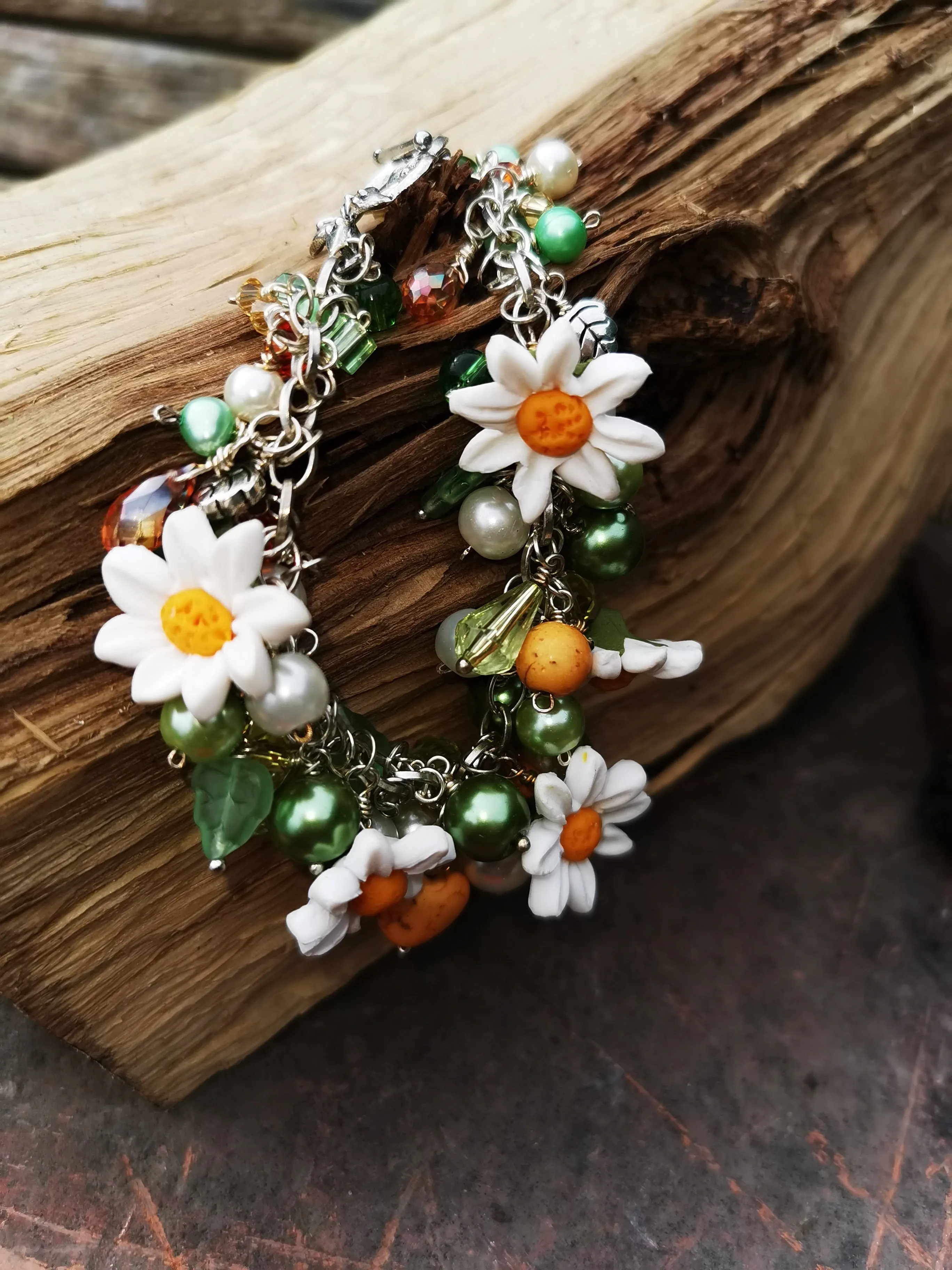 Daisy Chain, cluster charm bracelet with handmade polymer clay daises, 7.5 inches.