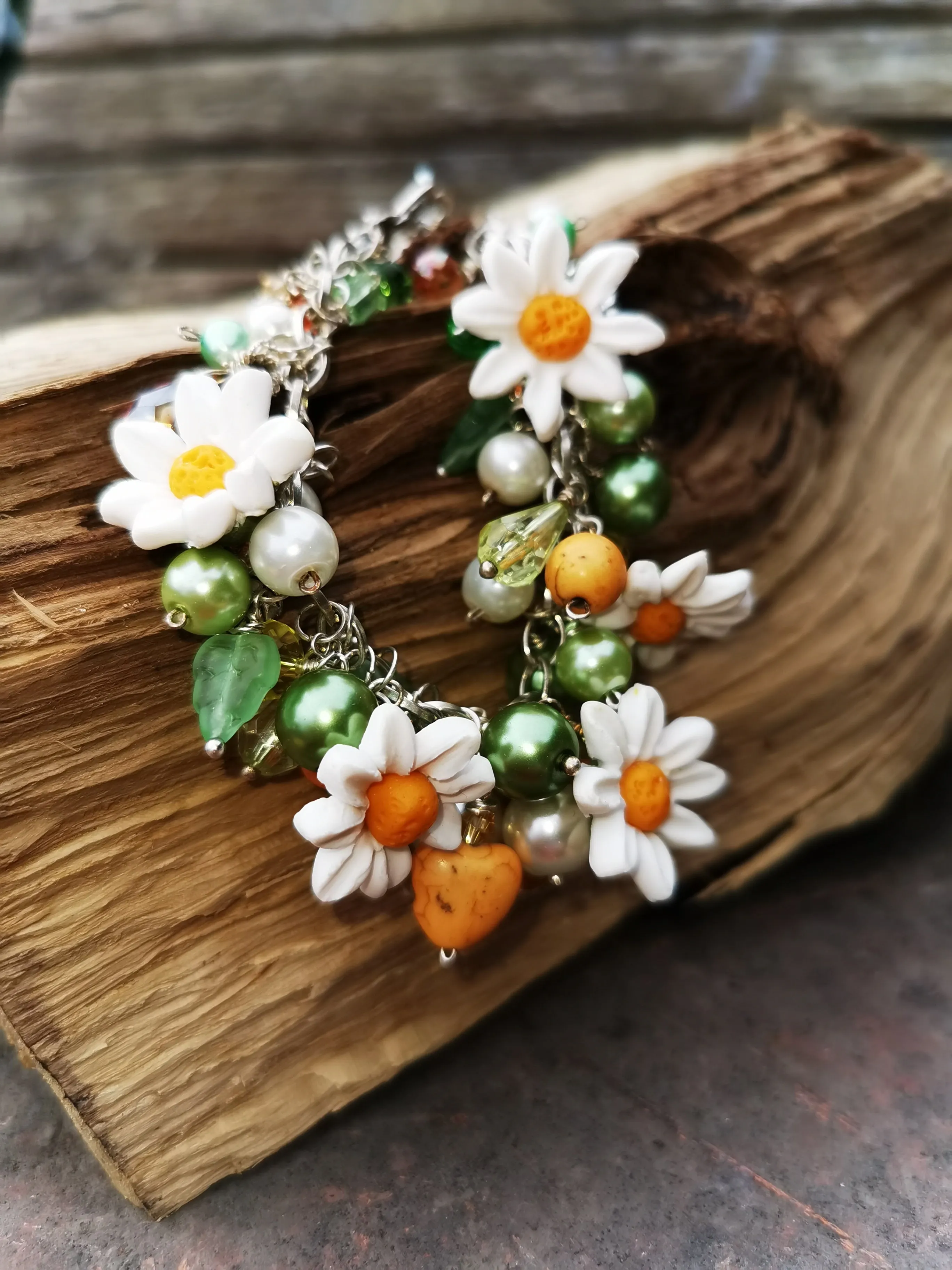 Daisy Chain, cluster charm bracelet with handmade polymer clay daises, 7.5 inches.