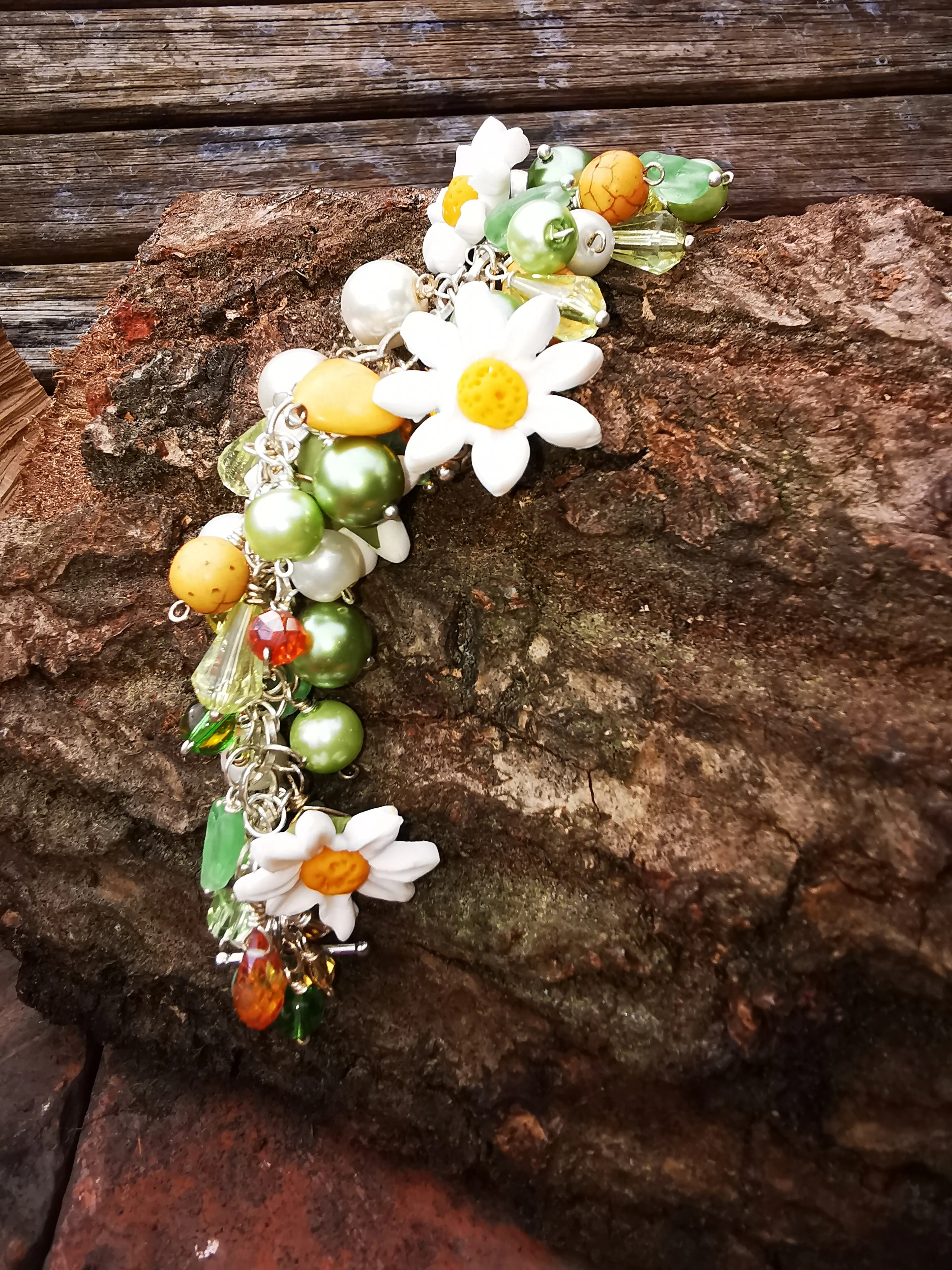 Daisy Chain, cluster charm bracelet with handmade polymer clay daises, 7.5 inches.