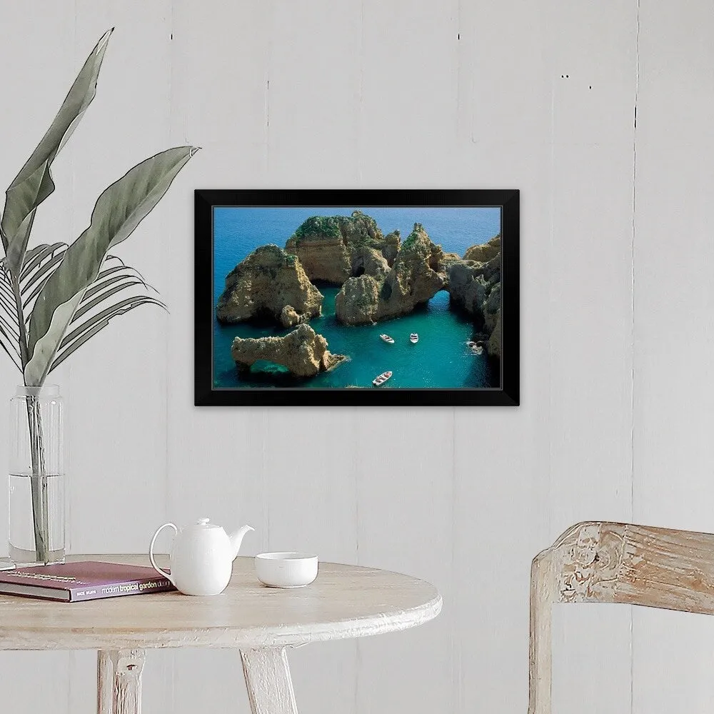 "Boats and rock formations" Black Framed Print